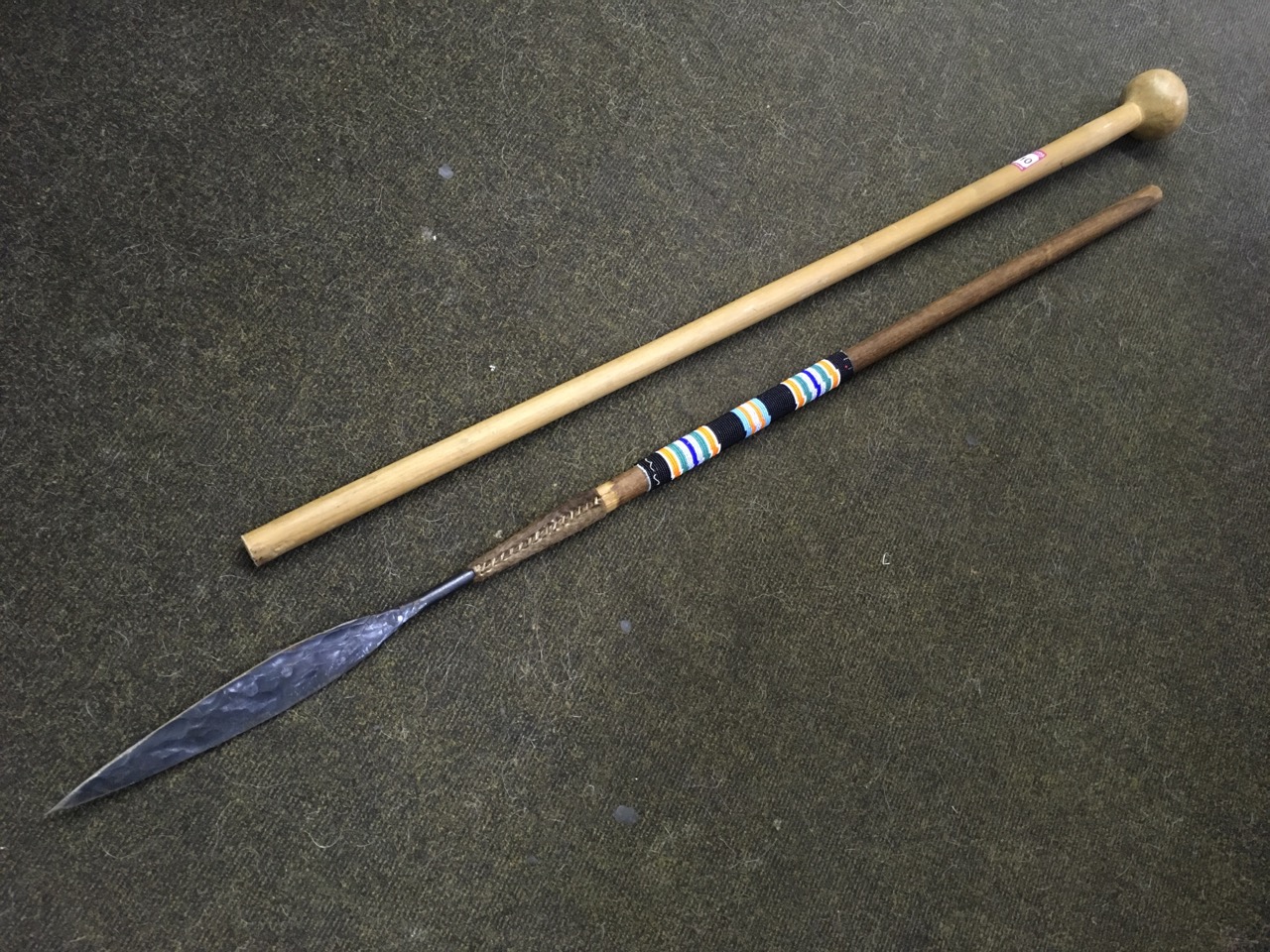 An African tribal spear mounted with beadwork to shaft, having skin collar to hand forged blade; and - Image 3 of 12