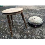 A circular nineteenth century hardwood milking stool on angled turned tapering legs; and a Victorian