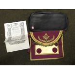 A leather case containing female leather masonic apron and certificates relating to Sister Mary