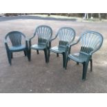 A set of three garden armchairs with arched backs and ribbed seats - stacking; and another