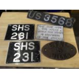 An oval cast iron railway sign - Etal 5 miles; an aluminium train sign; and two numberplates. (4)