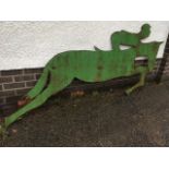 A large 8ft painted metal fretwork horse & jockey sign.