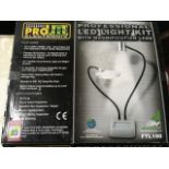 A boxed professional Prolite LED light kit with magnification lens, mounts for fly tying post, etc.