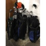 Four sets of Jaxx graphite titanium oversize youth golf clubs in Multilink bags with stands. (4)