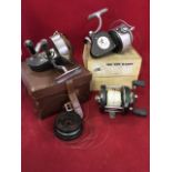 A boxed Hardy Exalta spinning reel; a boxed Hardy Altex No II spinning reel with spare spool; and an