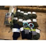 Fourteen pairs of Tweedside Tackle branded wool socks; two pairs of Teko childrens socks; and two
