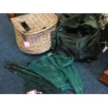 A lined Odyssey fishing bag containing tackle including a Shakespeare spinning reel, a box of flies,