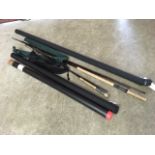 A Shakespeare Oracle three-piece 15ft salmon fly rod; and a Daiwa three-piece Exceler 11ft 3in fly