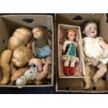 A German Simon & Halbig porcelain headed doll with composition jointed body; and a quantity of other