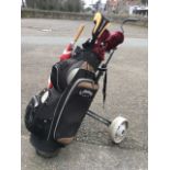 A set of Pal Joey golf clubs in a Calloway bag, complete with balls, tees, umbrella, etc, mounted on