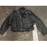 A leather bikers jacket by Sardar, the large size coat with zippers, belt, poppers, epaulettes, etc.