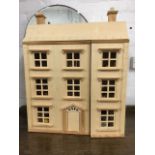 A Georgian style modern dolls house, the front elevation hinging to reveal a furnished interior with