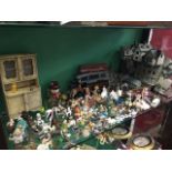 A large quantity of miniature and childrens items including ornaments, Dinky toys, animals, some