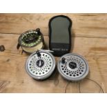 A cased Sonik SK4 fly reel with line; and a Leeda Rimfly fly reel with spare spool. (2)