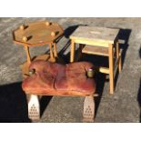 An Egyptian camel stool with leather cushion seat having studding to legs; and a hardwood step stool