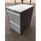 A two-drawer Bisley metal filing cabinet.