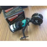 An Alcock Aerialite twin handled fishing reel; and a boxed Daiwa EG 9050H graphite spinning reel. (