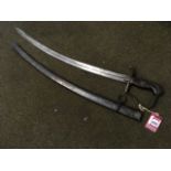 A late eighteenth century light cavalry trooper sabre with curved channelled blade, having bronze