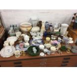 Miscellaneous ceramics including vases, Wade bells, a large handpainted jardiniere, moneyboxes, blue