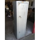 An 'approved' heavy gauge steel gun cabinet, with interior locking ammunition box, fitted for