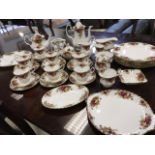 A Royal Albert Old Country Roses pattern teaset including cups, saucers, plates, cruet, jugs,