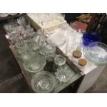 A quantity of glass including vases, bowls, jugs, storage jars, salts, cut and moulded, a biscuit