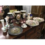 Miscellaneous ceramics including a pair of floral handpainted porcelain vases on cobblestone ground,