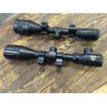 A Hawke Airmax 12 x 50 telescopic rifle sight - nitrogen charged; and another marked Nikko