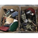 Two boxes of miscellaneous collectors items including some silver, lighters, boxes, tools, a brass