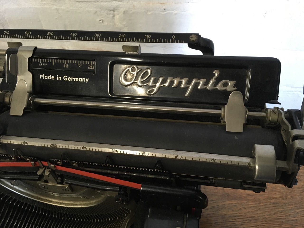 A German Olympia mechanical typewriter, the metal framed model 8 machine with Lows retail label. - Image 4 of 6