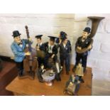 A collection of handpainted Laurel & Hardy figurines. (6)