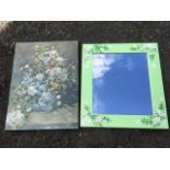 A modern rectangular mirror in floral stencilled frame; and a Renoir still life print titled