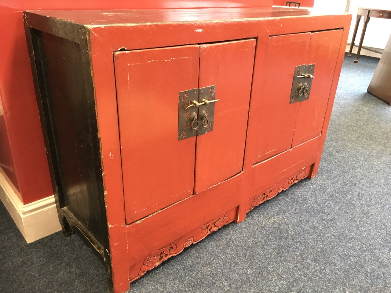 A nineteenth century Chinese lacquered cabinet, the four doors mounted with pierced stylised brass - Image 2 of 6