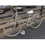 A Raleigh Caprice ladies bicycle, with Sturmey Archer 3 speed gears, original seat, dynamo lights, a
