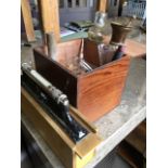 A pine box fitted for test-tubes and glass phails, a glass burner, thermometers, measuring vases,
