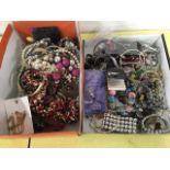 Two boxes of costume jewellery including bracelets, necklaces, beads, faux pearls, bangles, mother-