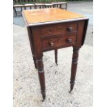 A nineteenth century mahogany drop-leaf occasional table, the moulded top above two frieze drawers