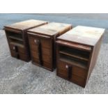 Three pedestals from a deco walnut kneehole desk - some drawers absent. (3)