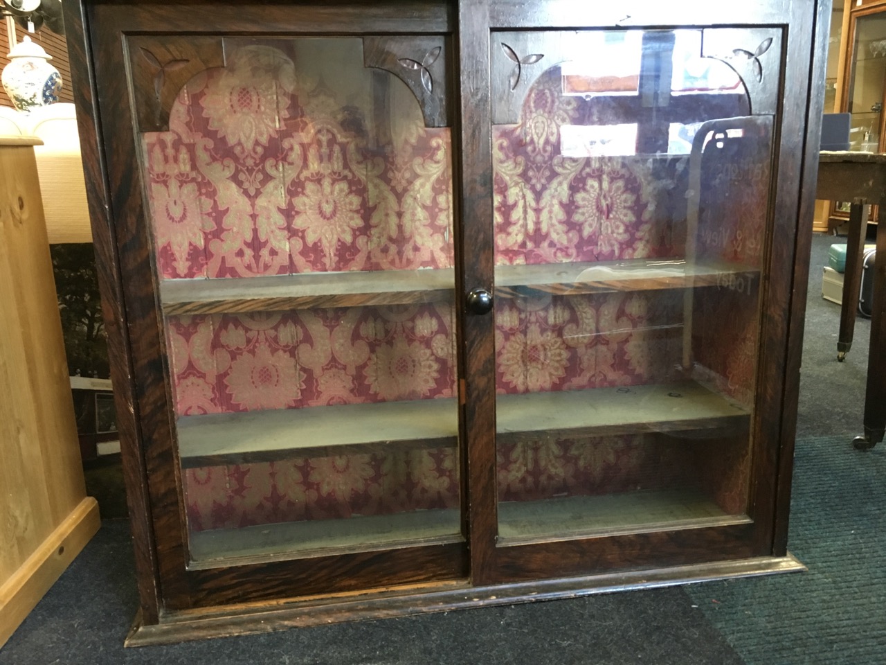 A Victorian glazed cupboard with scumbled decoration, having moulded cornice above a pair of sliding - Image 4 of 6