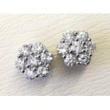 A pair of 18ct gold diamond earrings, the diamonds weighing a total of nearly two-and-a-half