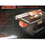 A boxed Challenge 8in bench 600W table saw.