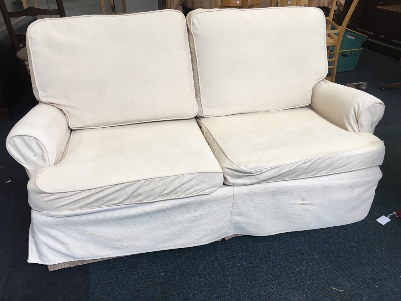 A contemporary two-seater sofa with loose cushions. - Image 2 of 6