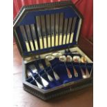 An oak cased canteen of silver plated cutlery - six settings, the bead mounted box complete with