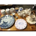 Miscellaneous ceramics including a delft charger, storage jar & covers, a pair of swan vases, some