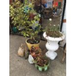 Various garden pots & urns, a stoneware wall plant pocket, a composition gnome, a wind chime,