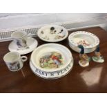 Four baby feeding plates and two cups decorated with nursery rhymes, golliwogs, "what are little