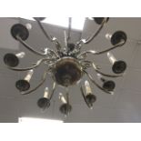 A Dutch style hanging chandelier, having central column hung from ceiling rose with twelve