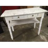 A Victorian marble top washstand, the moulded slab above a frieze with twin knobbed drawers,