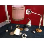 A 70s anglepoise lamp with weighted base; an aluminium lamp with adjustable spotlight on column; and