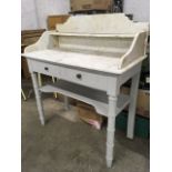 A painted pine Victorian marble top washstand, the carrera slab with shaped back and shelf, on a